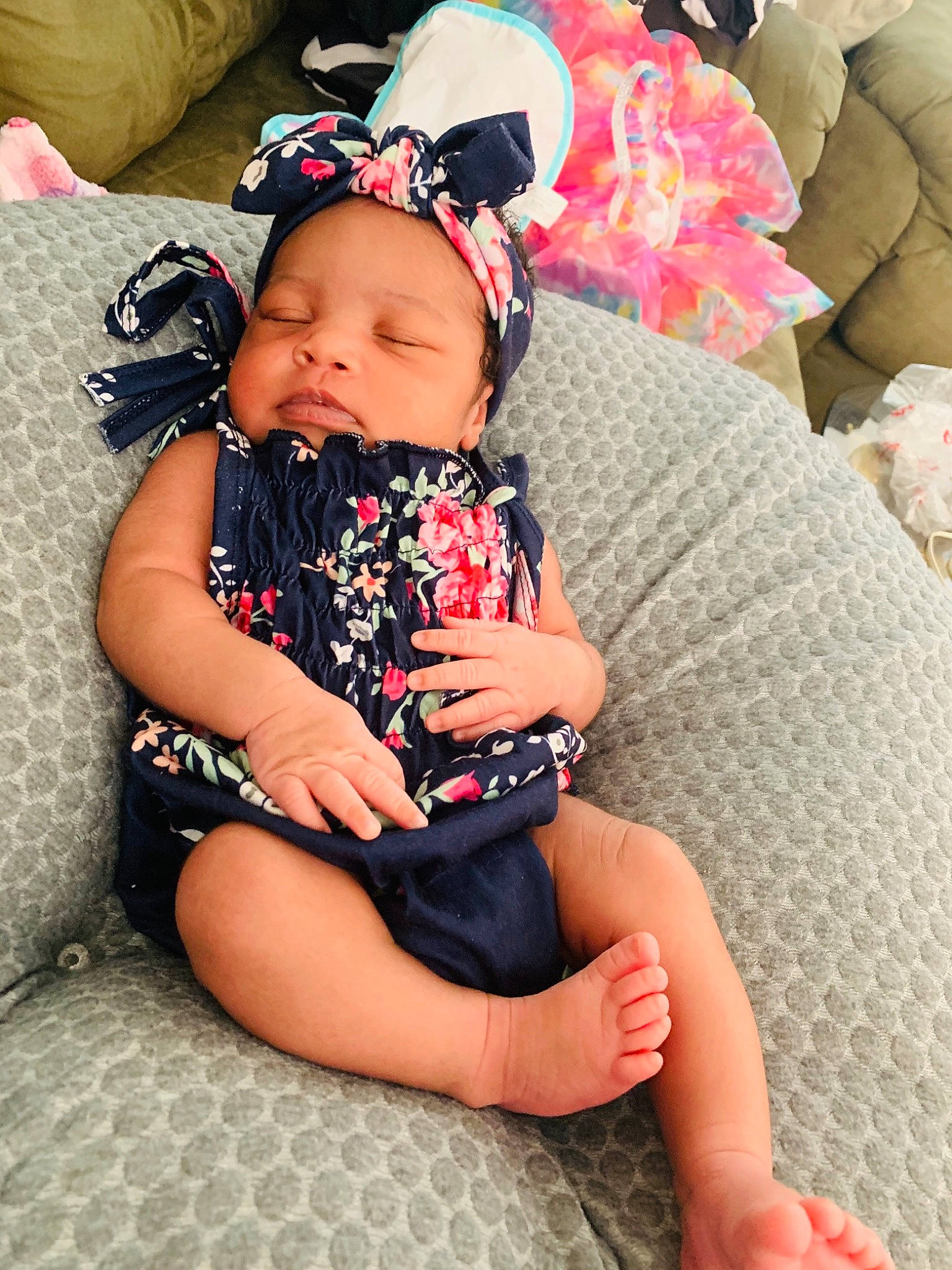 Chasity is registered to the contest to win money with this photo: abdomen, baby, baby_toddler_clothing, child, comfort, eye, finger, flash_photography, happy, headwear, human_body, human_leg, knee, lap, leg, mouth, person, pink, skin, thigh