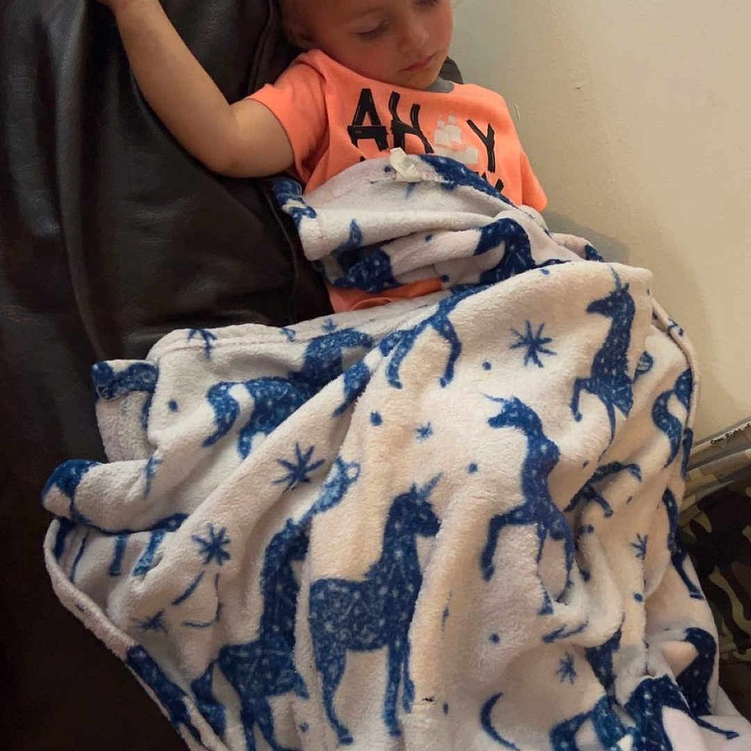 Brayzen is registered to the contest to win money with this photo: baby, bed, bedroom, blanket, clothing, couch, cushion, face, furniture, head, homedecor, indoors, person, photography, portrait, quilt, room, sleeping, t_shirt, towel