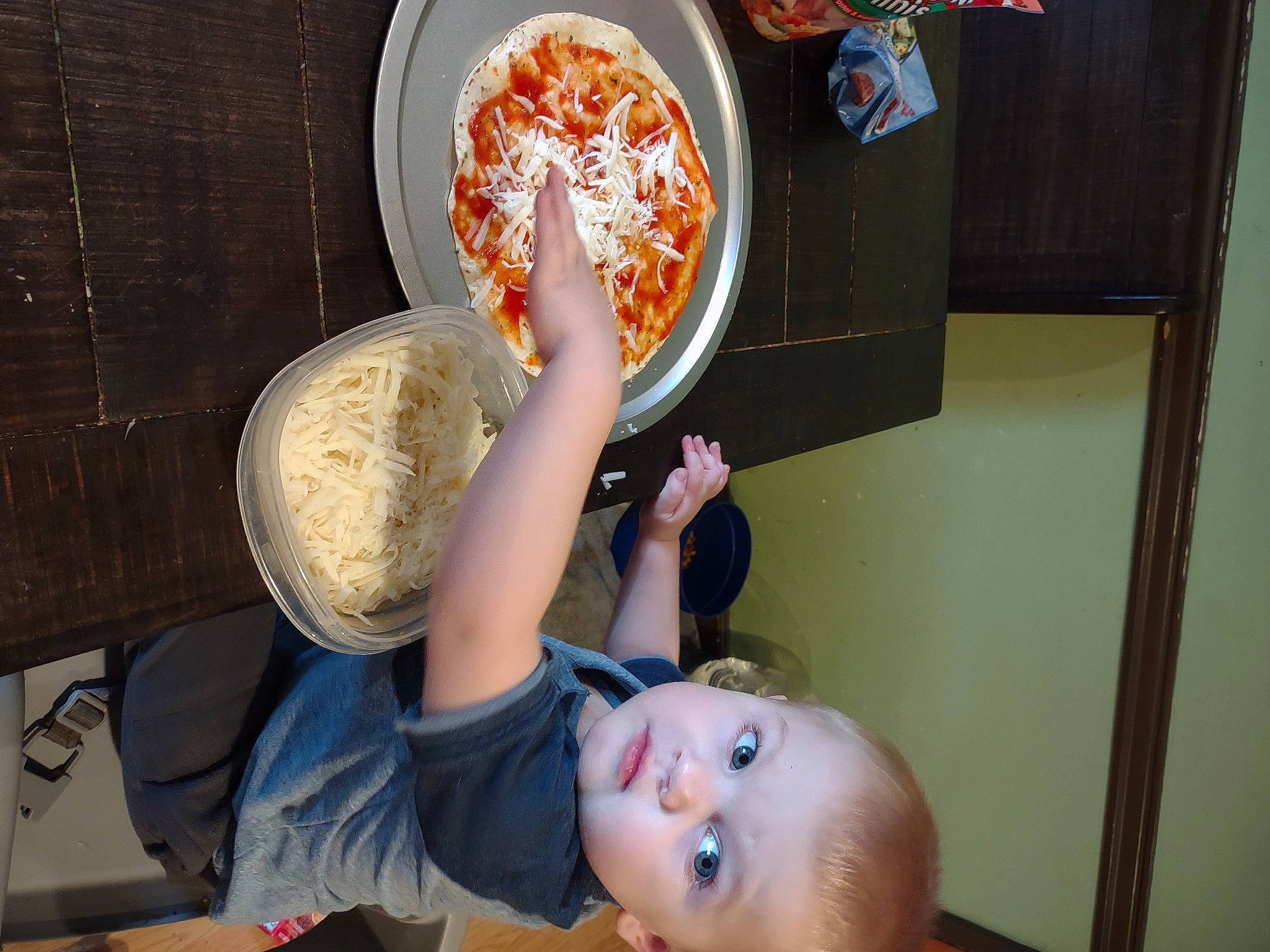Daniel joined the competition — help win amazing prizes! arm, baby, baby_toddler_clothing, bowl, child, comfort_food, cooking, cuisine, dish, dishware, food, ingredient, junk_food, kitchen_utensil, person, pizza, plate, platter, recipe, tableware
