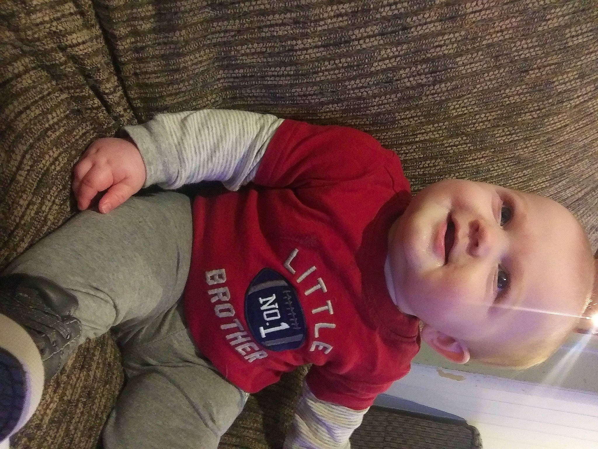 Daniel is registered to the contest to win money with this photo: baby, baby_toddler_clothing, cheek, child, comfort, cool, elbow, finger, flooring, fun, happy, human_leg, mouth, nose, person, skin, sleeve, smile, thigh, toddler