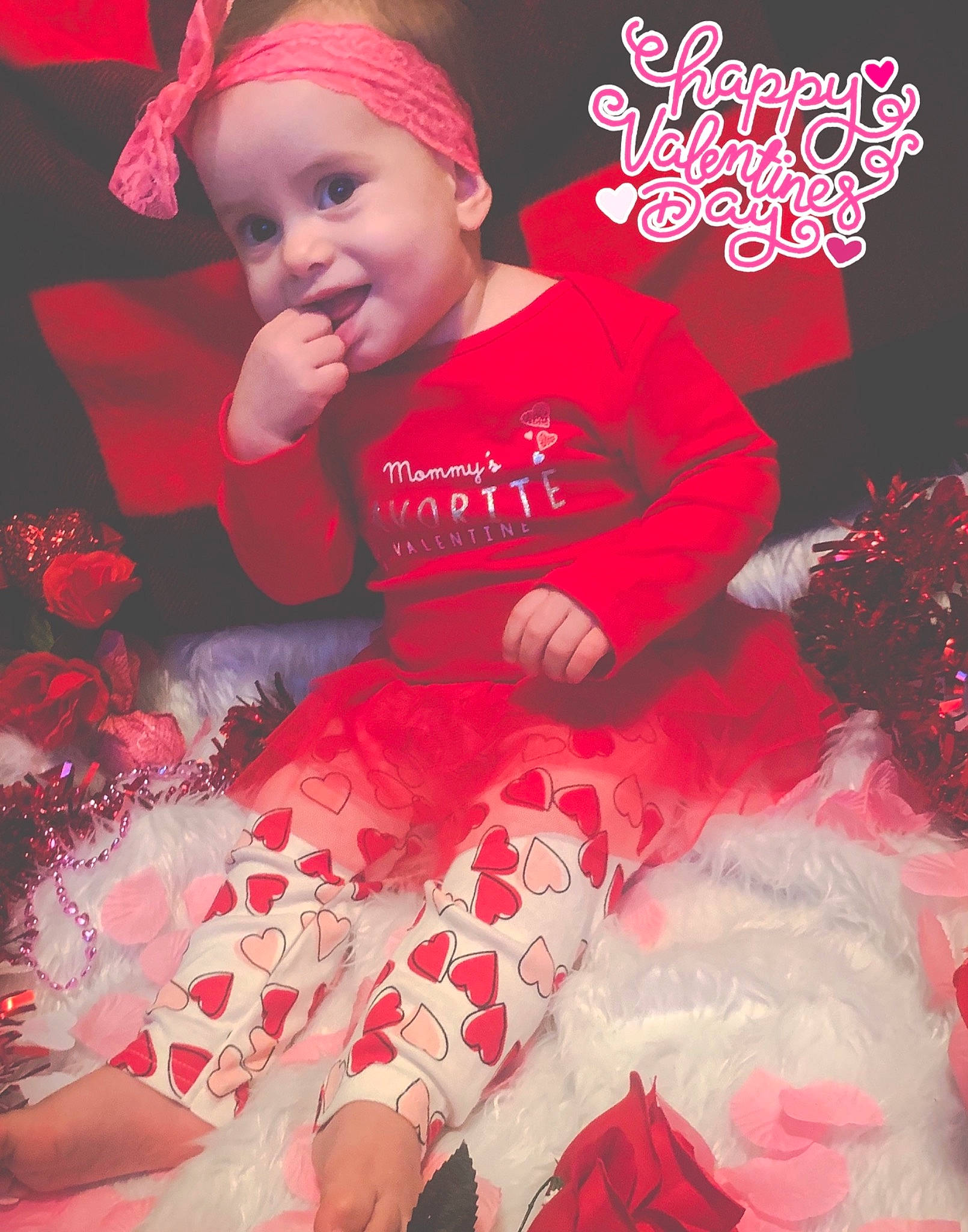 Aurelia joined the competition — help win amazing prizes! baby, baby_toddler_clothing, beauty, black, cap, child, event, happy, headwear, holiday, lap, magenta, pattern, person, pink, product, red, santa_claus, sleeve, t_shirt