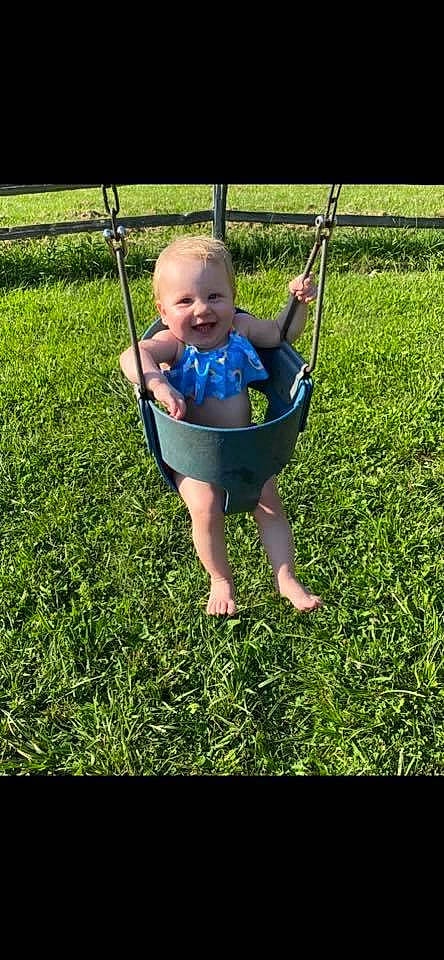 Amiliana joined the competition — help win amazing prizes! child, grass, joy, lawn, outdoor_play_equipment, person, plant, play, swing, toddler