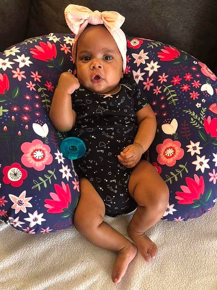 Aubrianna joined the competition — help win amazing prizes! baby, baby_products, baby_toddler_clothing, child, flower, headgear, pattern, person, pink, plant, sitting, toddler