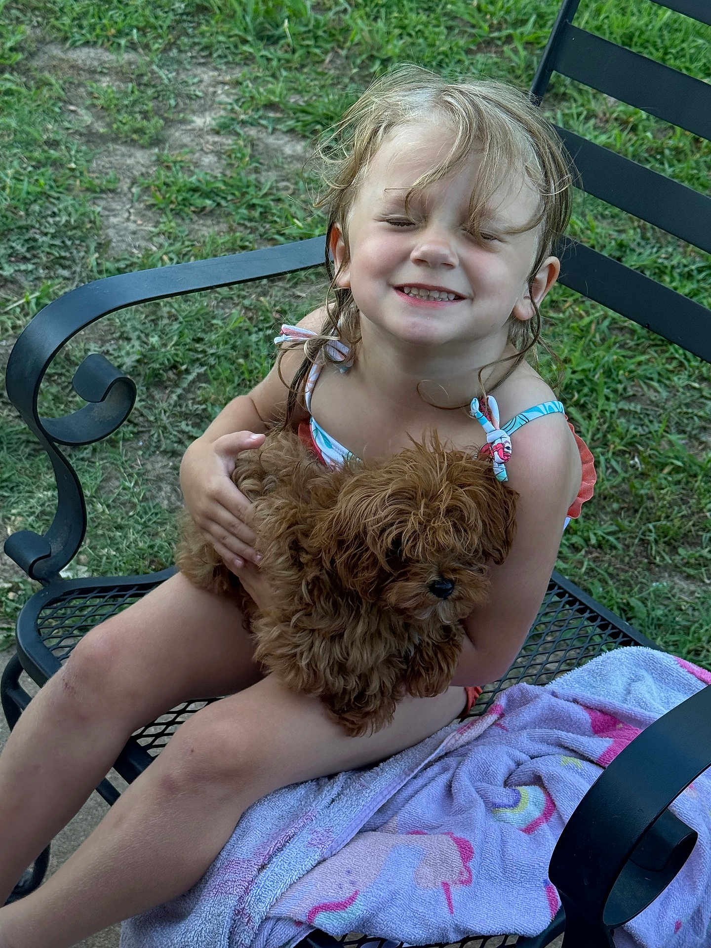 Nevaeh joined the competition — help win amazing prizes! child, puppy, dog, smiling, outdoor, grass, chair, towel, happy, cute, pet, summer, playful, young, sitting, person, nature, animal, friendship, fun