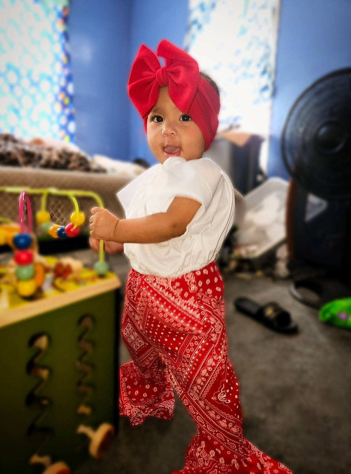 Divinity is registered to the contest to win money with this photo: animation, baby, child, costume, entertainment, event, fashion_design, flooring, formal_wear, fun, happy, hat, headwear, leisure, magenta, party_supply, peach, person, play, room