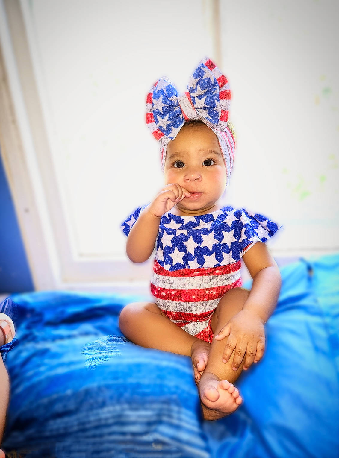 Divinity is registered to the contest to win money with this photo: azure, baby, baby_toddler_clothing, blue, dress, electric_blue, eye, flash_photography, happy, hat, headband, headgear, headpiece, magenta, pattern, person, pink, purple, sleeve, smile