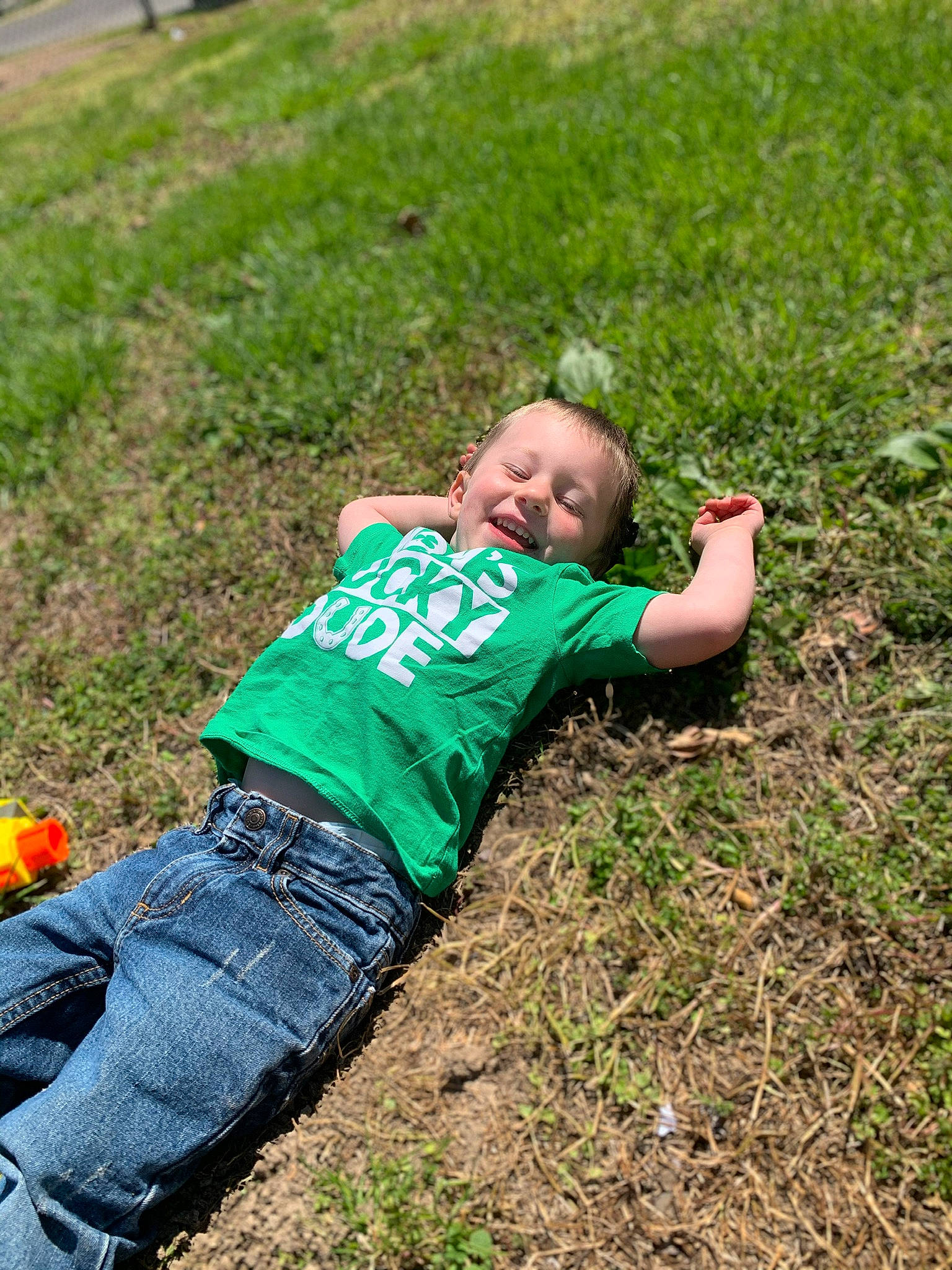 Dennis joined the competition — help win amazing prizes! baby, baby_toddler_clothing, child, denim, grass, grass_family, human, jeans, joy, lawn, people_in_nature, person, play, toddler, walking_shoe