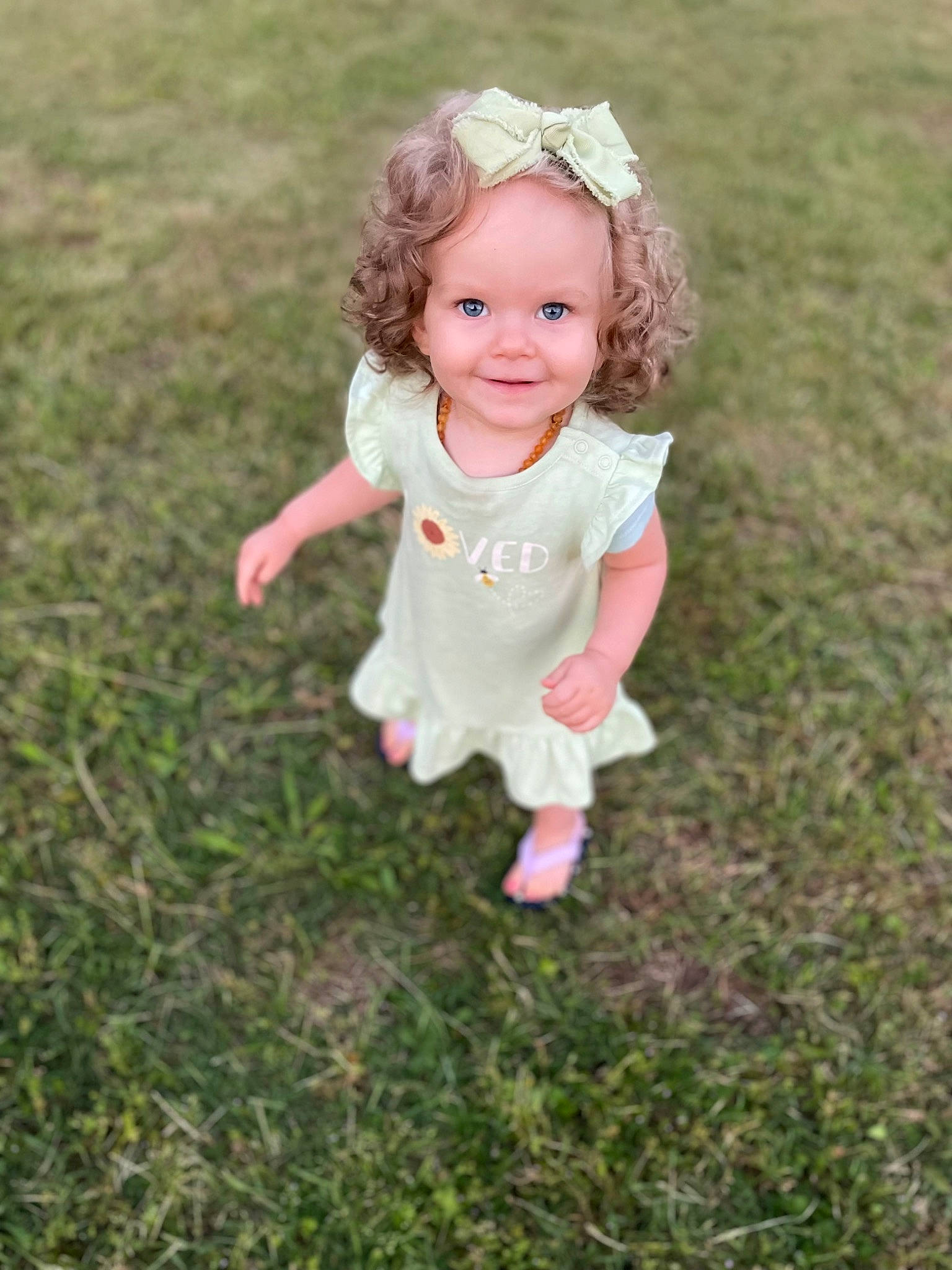 Aleeyah joined the competition — help win amazing prizes! baby, baby_toddler_clothing, eye, face, fun, gesture, grass, grass_family, grassland, happy, human_body, joy, lawn, meadow, people_in_nature, person, pink, plant, recreation, smile