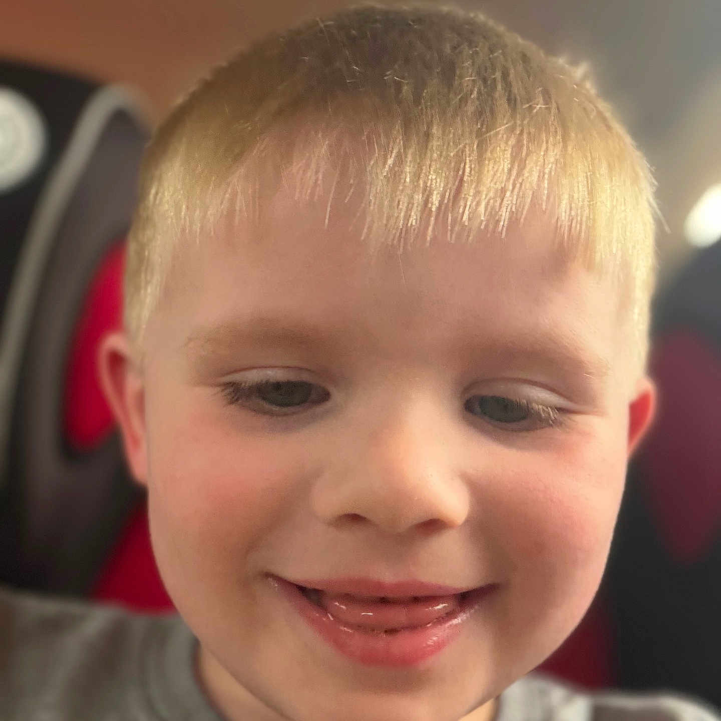 Owyn joined the competition — help win amazing prizes! child, blonde_hair, smiling, tongue_out, close_up, face, happy, young, portrait, casual_clothing, indoor, skin, head, person, cute, playful, childhood, expression, cheeks, light