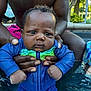 Wesley joined the competition — help win amazing prizes! baby, child, swimsuit, pool, water, adult, hands, outdoor, summer, cute, portrait, skin, expression, curly_hair, holding, blue, colorful, person, fun, splash