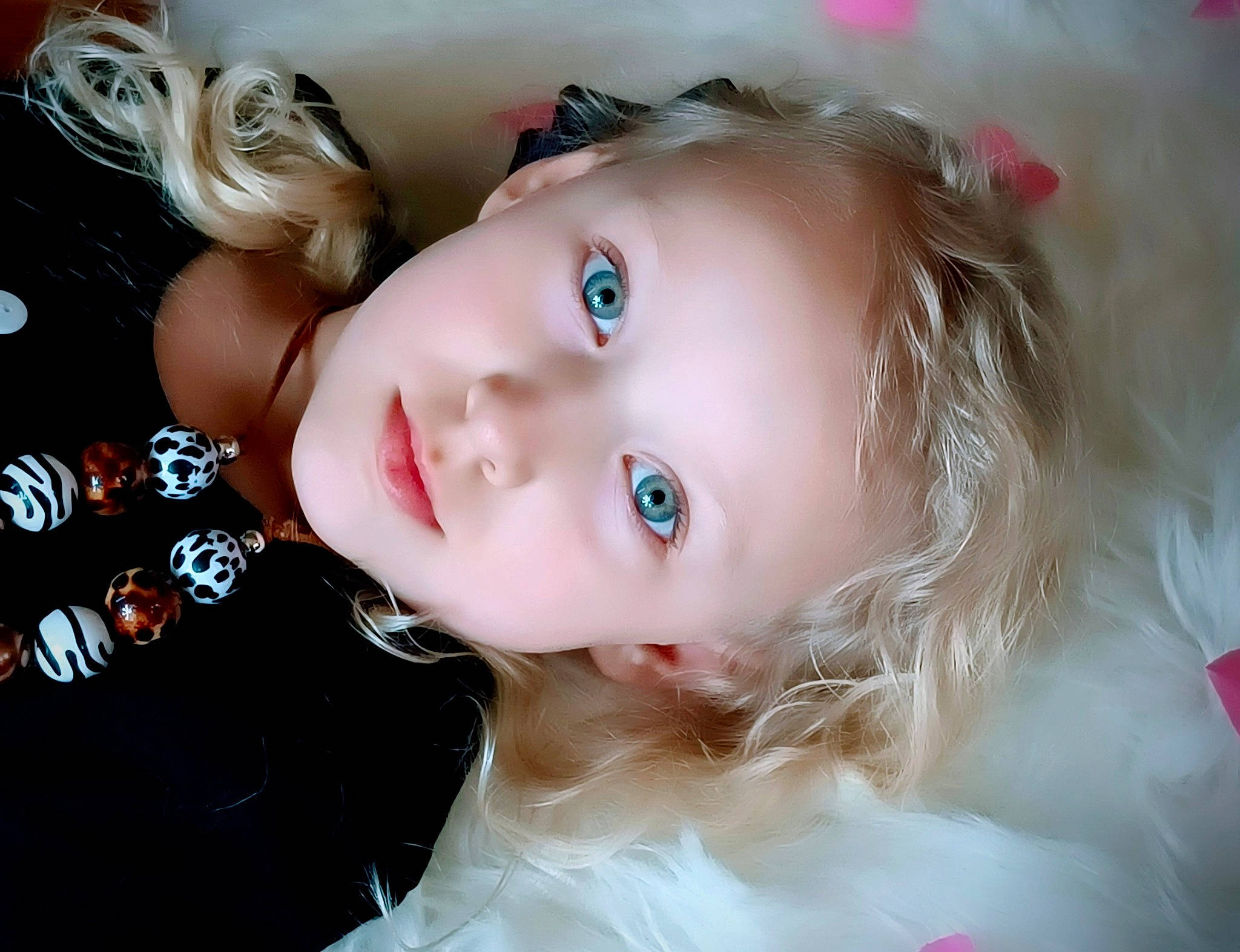 Emberlynn is registered to the contest to win money with this photo: baby, blond, bridal_accessory, brown_hair, cheek, chin, eyebrow, eyelash, fashion_accessory, flash_photography, hair_accessory, happy, headpiece, iris, lip, long_hair, nose, person, skin, toddler