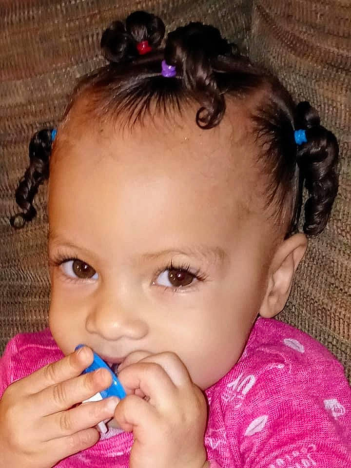 Dasani is registered to the contest to win money with this photo: blue, cheek, chin, ear, eyebrow, eyelash, facial_expression, forehead, gesture, hair, hairstyle, head, iris, lip, mouth, neck, nose, organ, person, pink