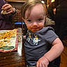 Kayn joined the competition — help win amazing prizes! toddler, child, indoor, restaurant, food, sauce, messy, table, menu, wooden_table, person, casual_clothing, curious, seated, face, hair, hand, chair, dining, background_people