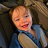 Kayn is registered to the contest to win money with this photo: toddler, child, smiling, car_seat, blue_shirt, happy, face, seatbelt, indoor, portrait, young_child, hair, person, baby, clothing, cute, seat, safety, expression, closeup