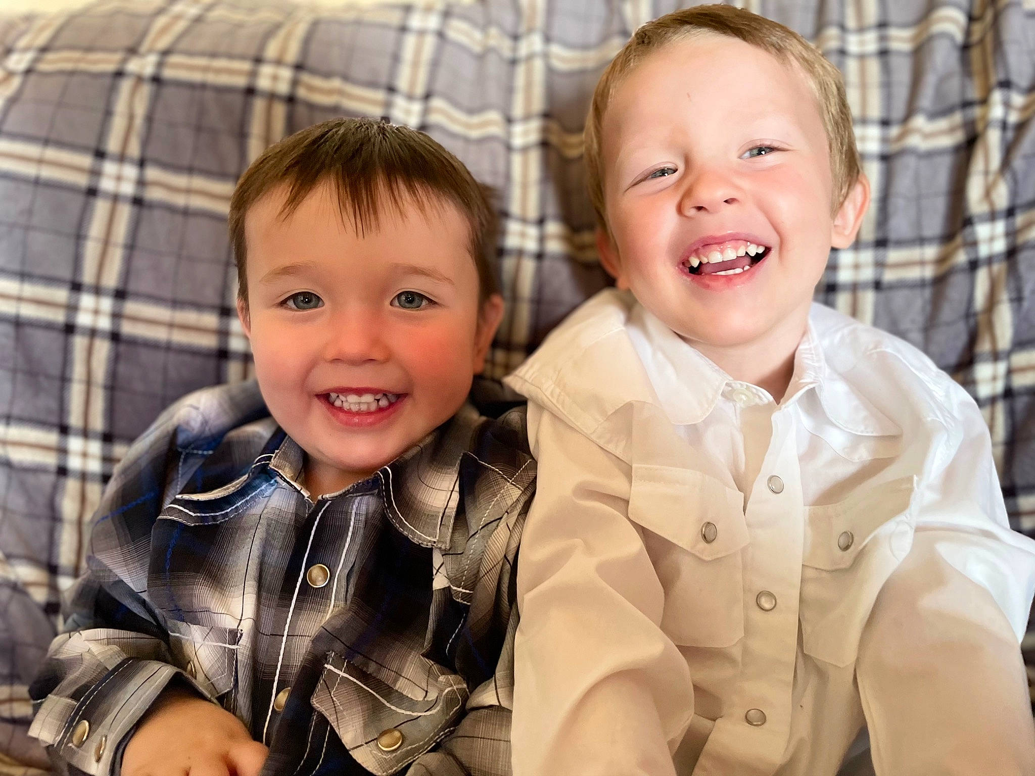 Augustus is registered to the contest to win money with this photo: baby, baby_toddler_clothing, cheek, chin, collar, dress_shirt, eye, face, finger, gesture, hairstyle, happy, head, iris, joy, nose, organ, person, skin, sleeve