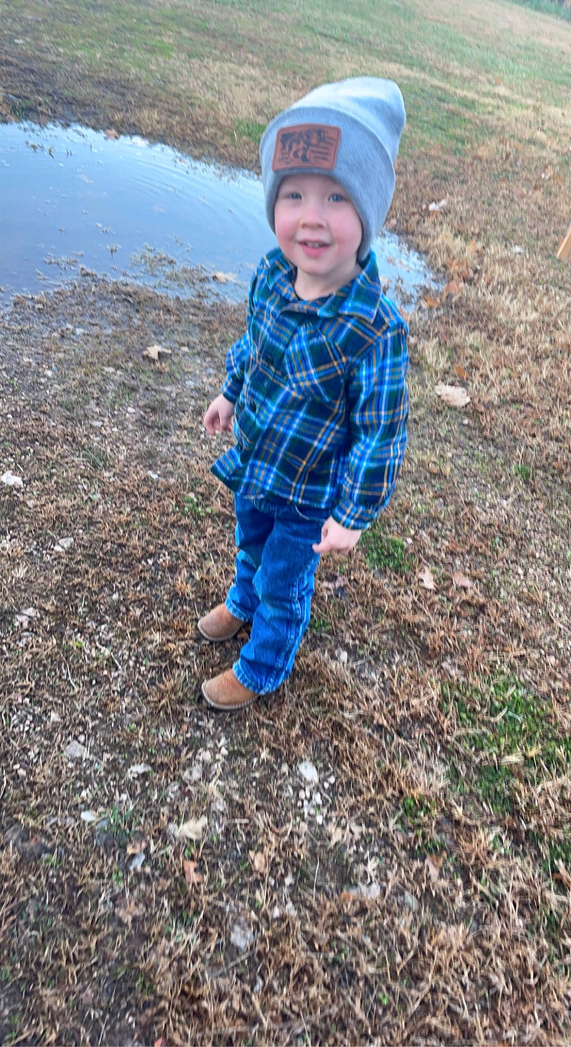 Augustus joined the competition — help win amazing prizes! baby_toddler_clothing, cap, child, electric_blue, fun, grass, headwear, jacket, joy, leaf, pattern, people_in_nature, person, plaid, plant, recreation, sleeve, smile, soil, tartan