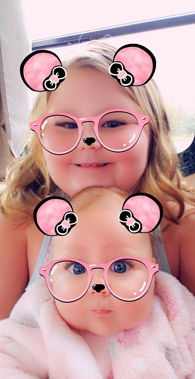 Lola is registered to the contest to win money with this photo: black_hair, cartoon, cheek, cool, ear, eyewear, face, fun, glasses, headwear, joy, lip, mouth, nose, person, pink, selfie, skin, smile, sunglasses