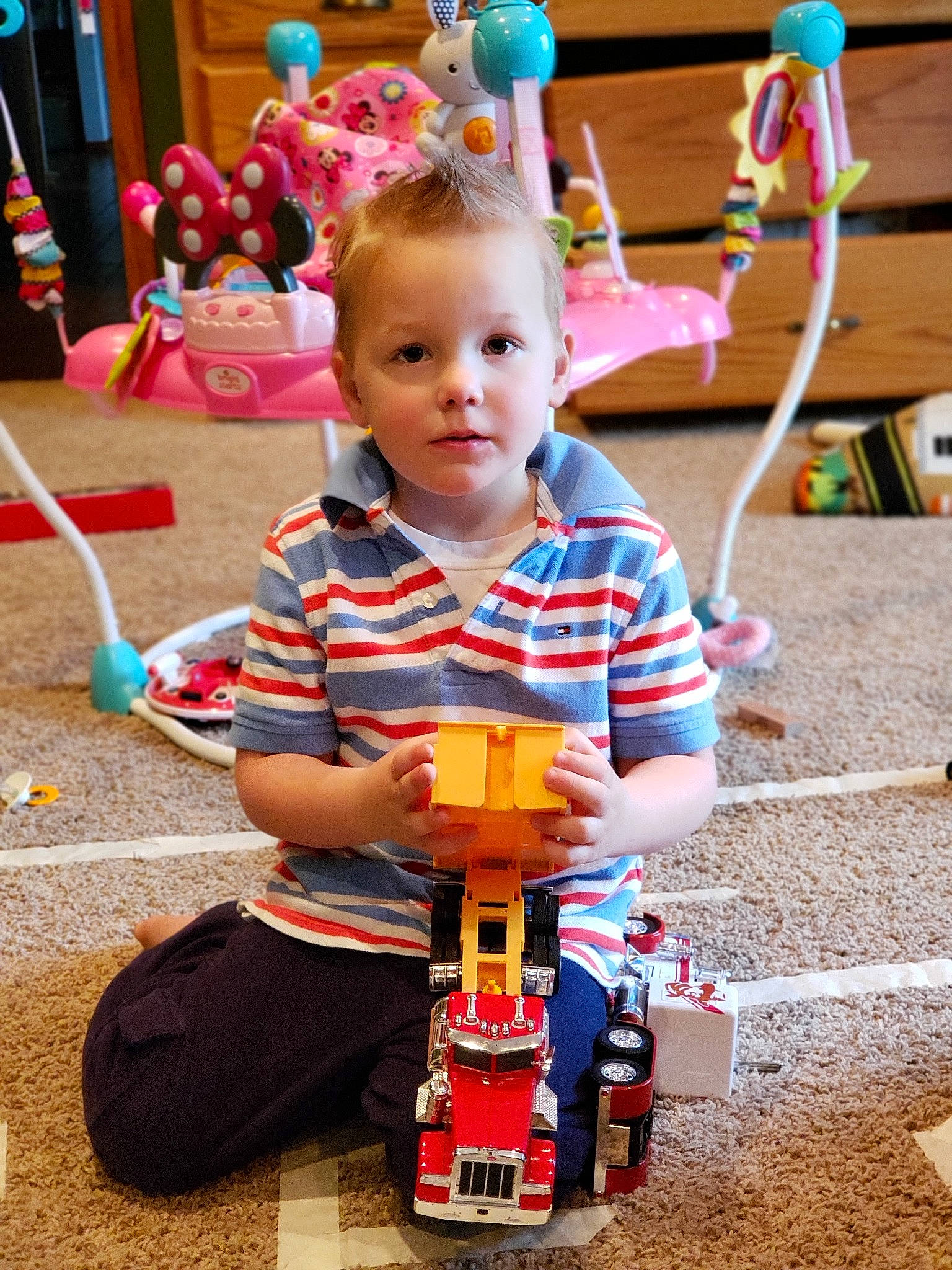 Griffin is registered to the contest to win money with this photo: child, person, play, smile, toddler, toy