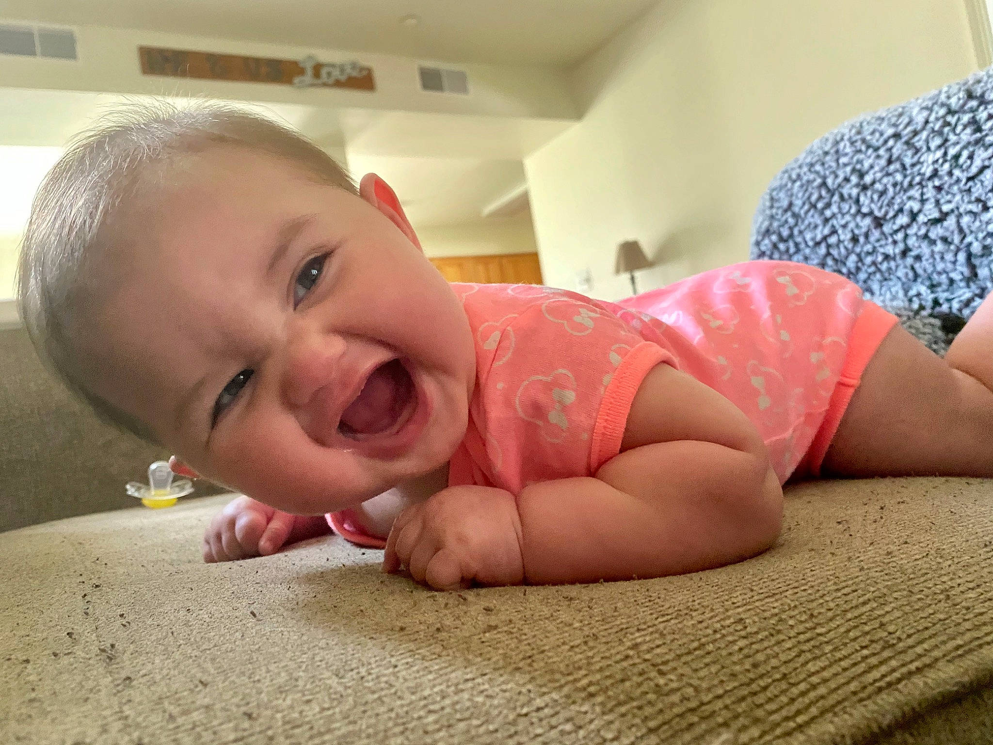 Hadlee joined the competition — help win amazing prizes! baby, cheek, child, crawling, ear, face, facial_expression, finger, fun, hand, head, mouth, nose, person, skin, smile, toddler, tummy_time