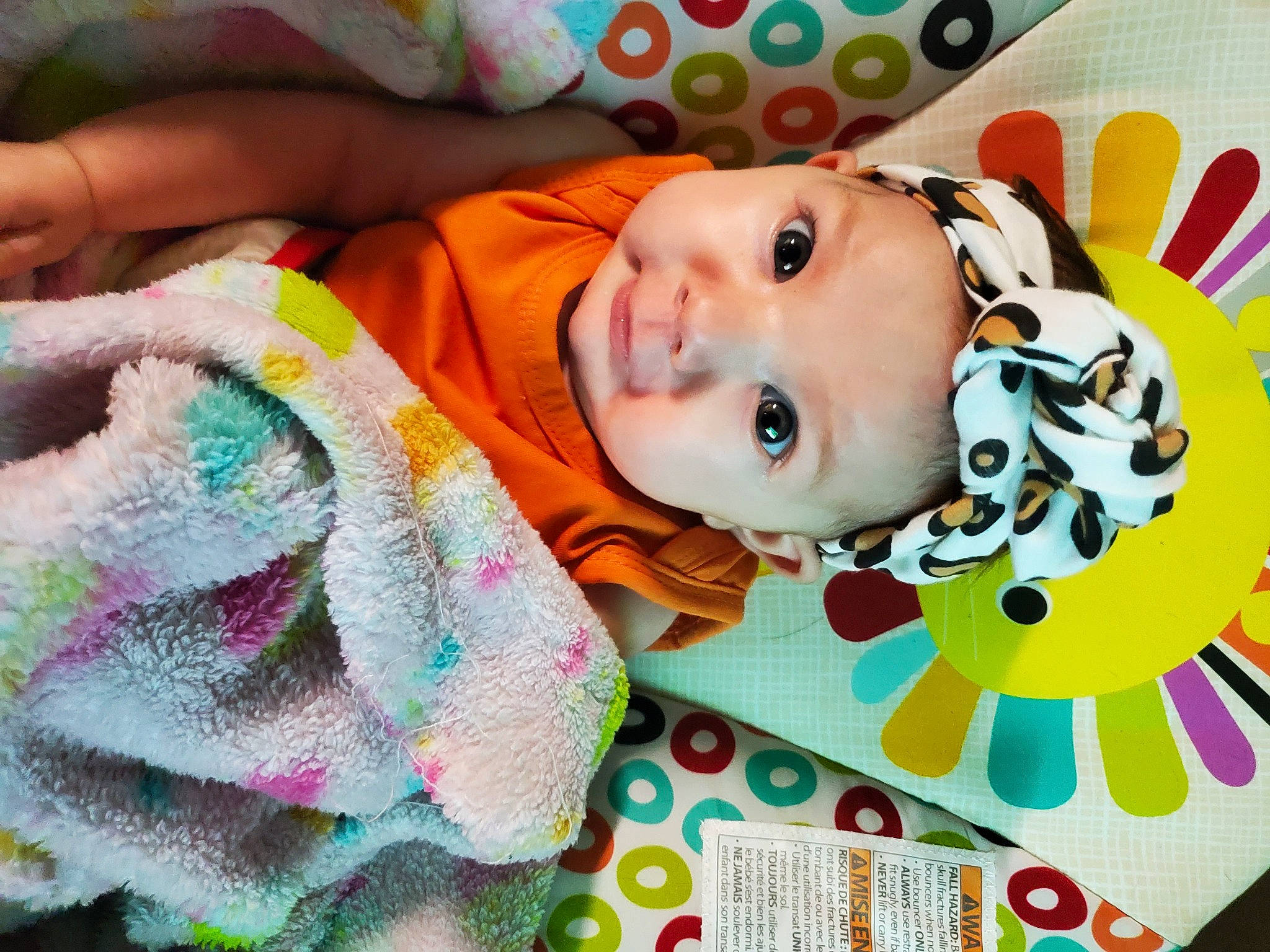 Aspen is registered to the contest to win money with this photo: baby, baby_products, baby_toddler_clothing, cheek, child, eye, fun, green, happy, headwear, iris, linens, nose, pattern, person, pink, smile, textile, toddler, wool