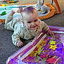 activity_gym, baby, carpet, child, clothing, colorful, crawling, cute, floor, happy, indoor, infant, play, playmat, portrait, room, smiling, soft_toy, toy, young_child