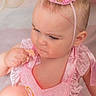 baby, birthday_crown, blue_eyes, cake, celebration, child, cute, face, frosting, hand, headband, indoor, lace, one_year_old, pink_dress, portrait, serious_expression, sitting, skin, tutu