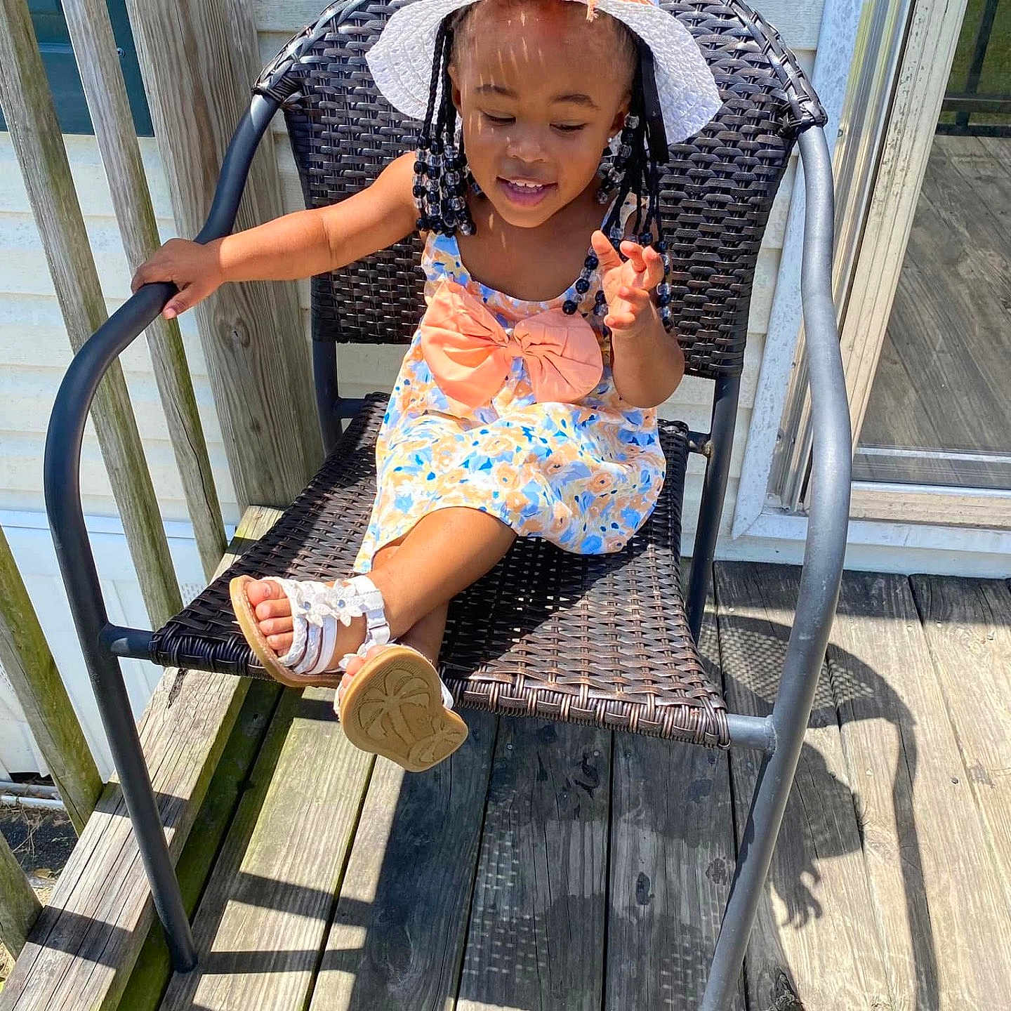 Sanyla Rose joined the competition — help win amazing prizes! chair, child, clothing, cream, dessert, face, female, food, footwear, furniture, girl, hat, head, icecream, person, photography, portrait, sandal, sitting, summer