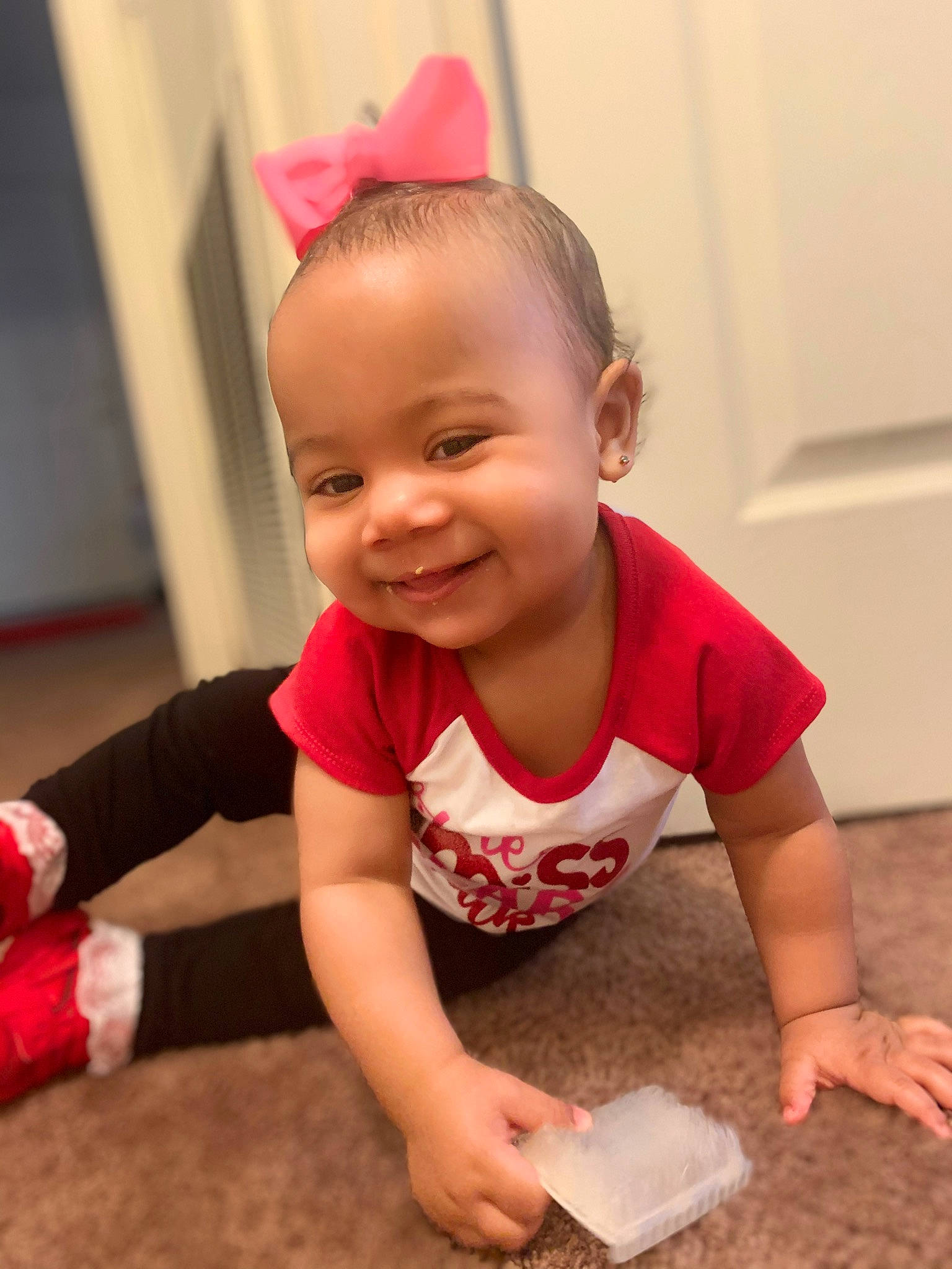 Eliyanah joined the competition — help win amazing prizes! arm, baby, baby_toddler_clothing, cheek, child, crawling, event, finger, floor, flooring, fun, happy, hardwood, joy, person, room, skin, smile, t_shirt, toddler