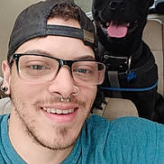 Max joined the competition — help win amazing prizes! man, dog, car, selfie, glasses, smile, nose_ring, cap, seat, pet, happy, tongue_out, black_dog, casual_clothing, interior, friendship, beard, earrings, leather_seat, daylight