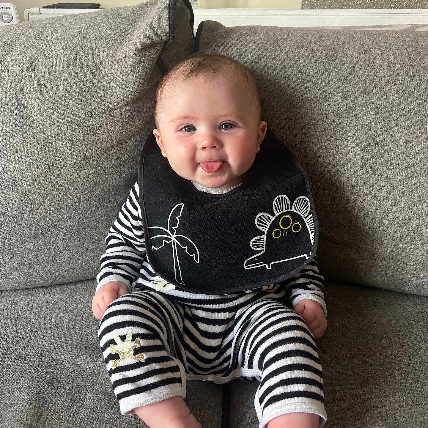 Leo joined the competition — help win amazing prizes! architecture, baby, building, clothing, couch, cushion, face, furniture, happy, head, homedecor, indoors, livingroom, pants, person, photography, portrait, room, sitting, smile