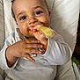Aiden a rejoint le concours — aidez-le/la à gagner de superbes lots ! baby, child, messy, food, high_chair, spoon, face, hands, white_clothing, mealtime, cute, indoor, expression, smile, closeup, infant, feeding, mess, playful, young