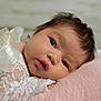 Anari is registered to the contest to win money with this photo: baby, infant, face, portrait, closeup, blanket, pink, white_lace, soft, cute, child, newborn, expression, resting, skin, head, hair, indoors, young, sleepy