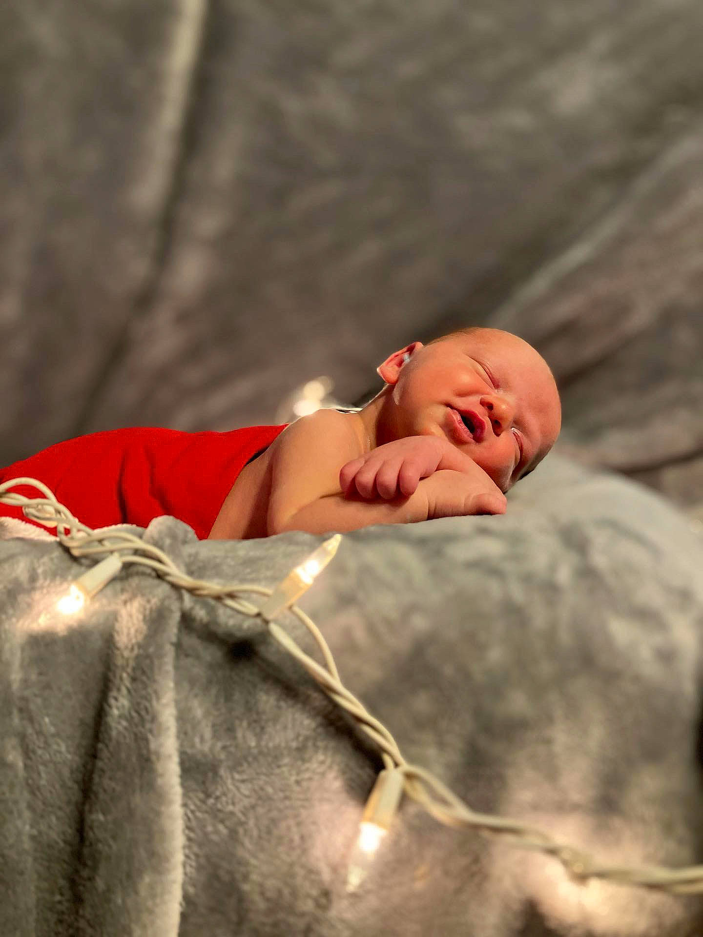 Tristan is registered to the contest to win money with this photo: baby, child, comfort, flash_photography, flesh, fur, grass, happy, landscape, linens, nap, neck, person, portrait_photography, rock, sitting, sleep, toddler, wood