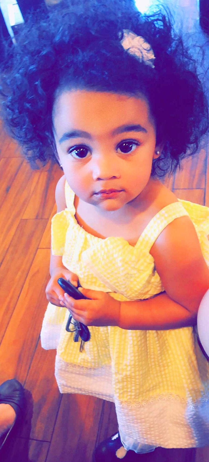 Jacqueline is registered to the contest to win money with this photo: afro, beauty, black_hair, cheek, child, face, forehead, hair, hairstyle, lip, nose, person, play, skin, smile, toddler, yellow