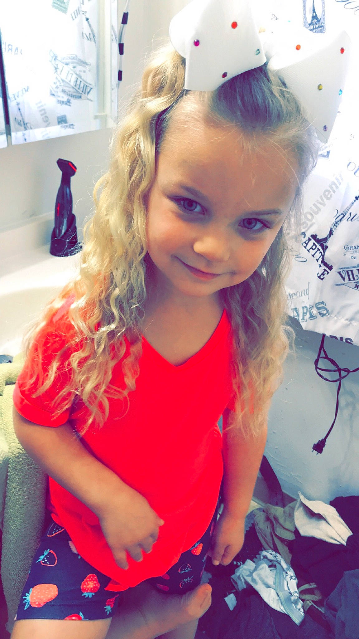 Haidyn is registered to the contest to win money with this photo: blond, brown_hair, child, child_model, ear, eyelash, fashion_accessory, hair, hair_accessory, hair_coloring, hairstyle, headband, long_hair, person, pigtail, pink, smile, toddler