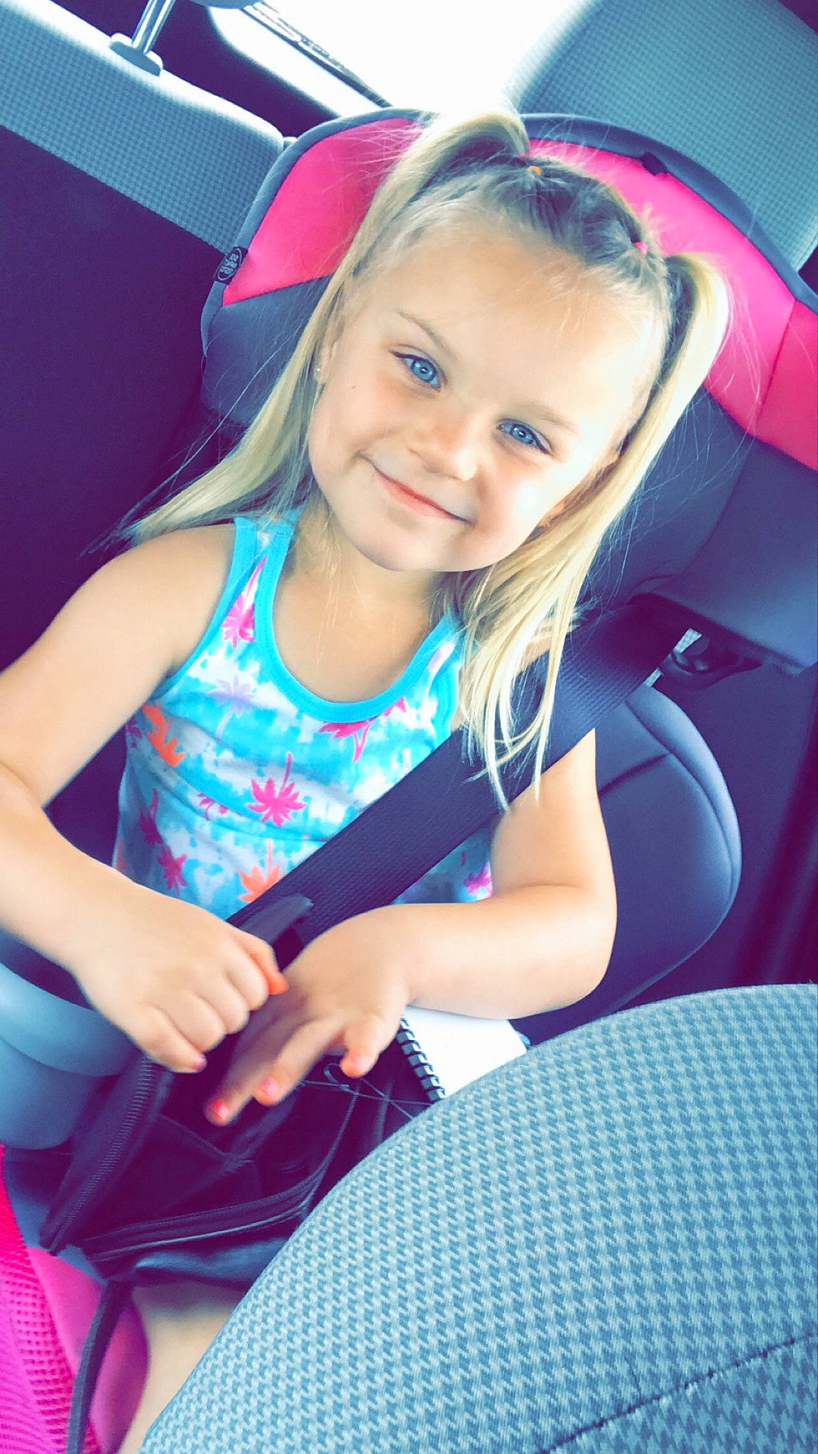 Haidyn joined the competition — help win amazing prizes! auto_part, beauty, blond, car, car_seat, child, child_model, ear, fun, headgear, joy, long_hair, magenta, person, pink, sitting, skin, smile, toddler, vacation