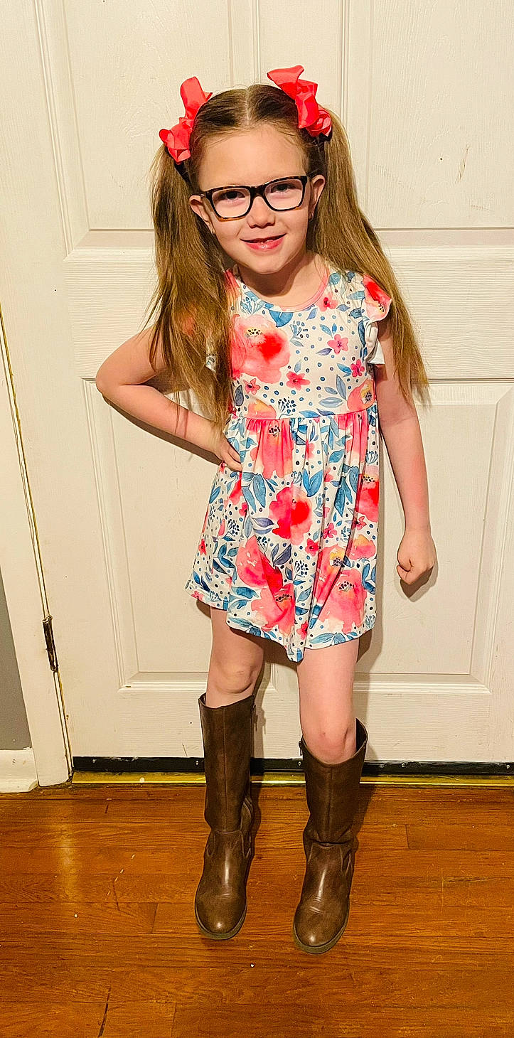 Mya is registered to the contest to win money with this photo: cool, dress, fashion, hair, hairstyle, head, joint, joy, knee, leg, neck, person, pink, shoe, shoulder, skin, sleeve, standing, thigh, vision_care