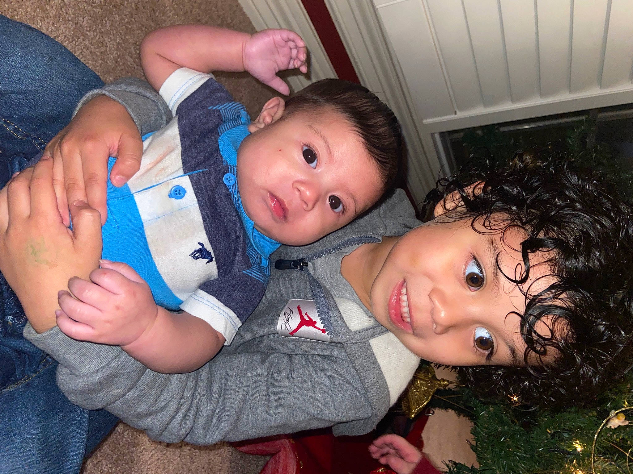 Jasiah is registered to the contest to win money with this photo: baby, baby_products, baby_toddler_clothing, cheek, child, comfort, event, flash_photography, fun, gesture, grass, hand, happy, iris, lap, mouth, nose, person, sitting, smile