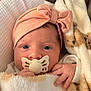 Luisa participe au concours pour gagner de l'argent avec cette photo : baby, pacifier, blanket, hat, face, hand, infant, newborn, cute, cozy, soft, warm, sleepwear, closeup, indoors, portrait, child, person, headwear, comfort