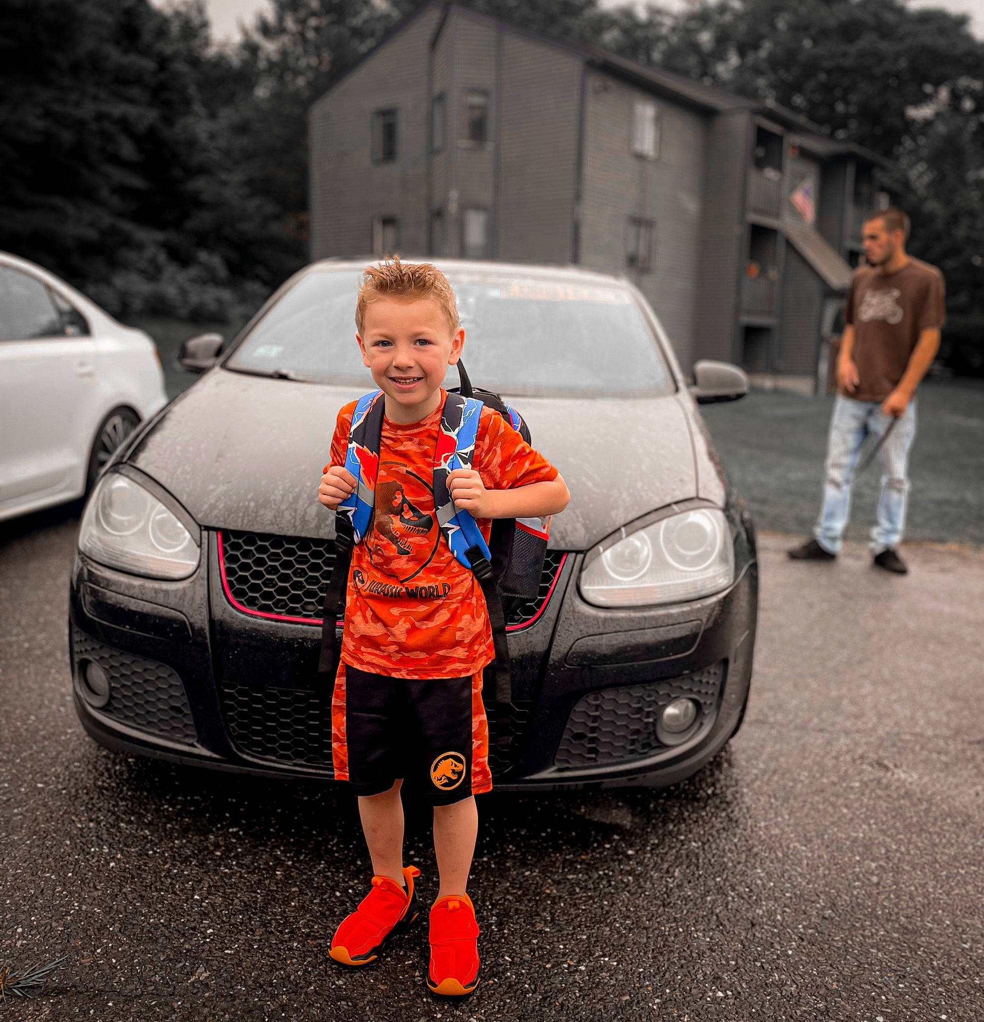 Jax joined the competition — help win amazing prizes! alloy_wheel, asphalt, automotive_design, automotive_exterior, automotive_lighting, automotive_tire, blurred, bumper, car, grille, headlamp, hood, joy, land_vehicle, motor_vehicle, person, rim, rolling, tire, tree