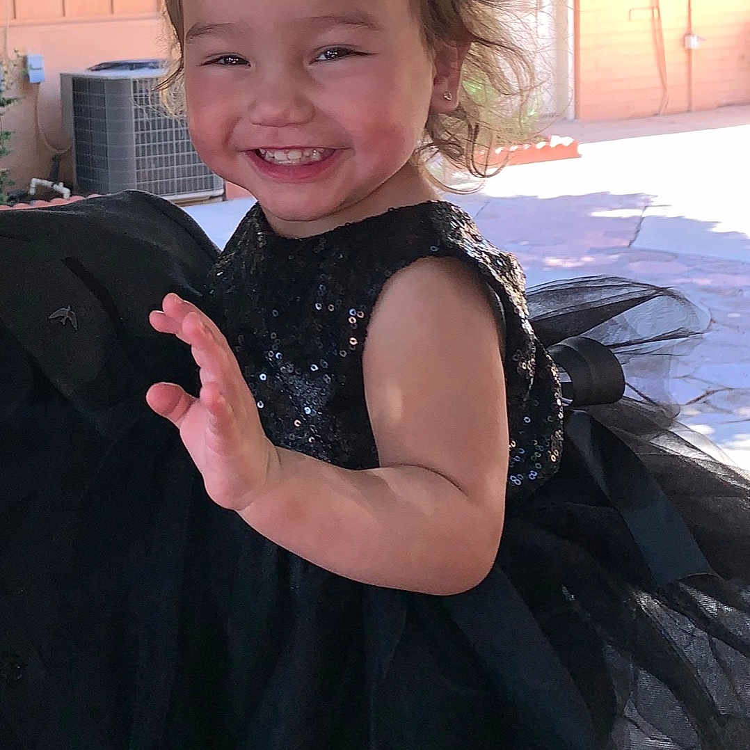 Zayna is registered to the contest to win money with this photo: arm, child, joy, person, smile, toddler