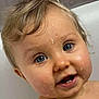 baby, child, face, blue_eyes, wet_skin, teeth, curly_hair, close_up, expression, cute, skin, portrait, infant, happy, water_drops, indoors, head, looking, mouth_open, young