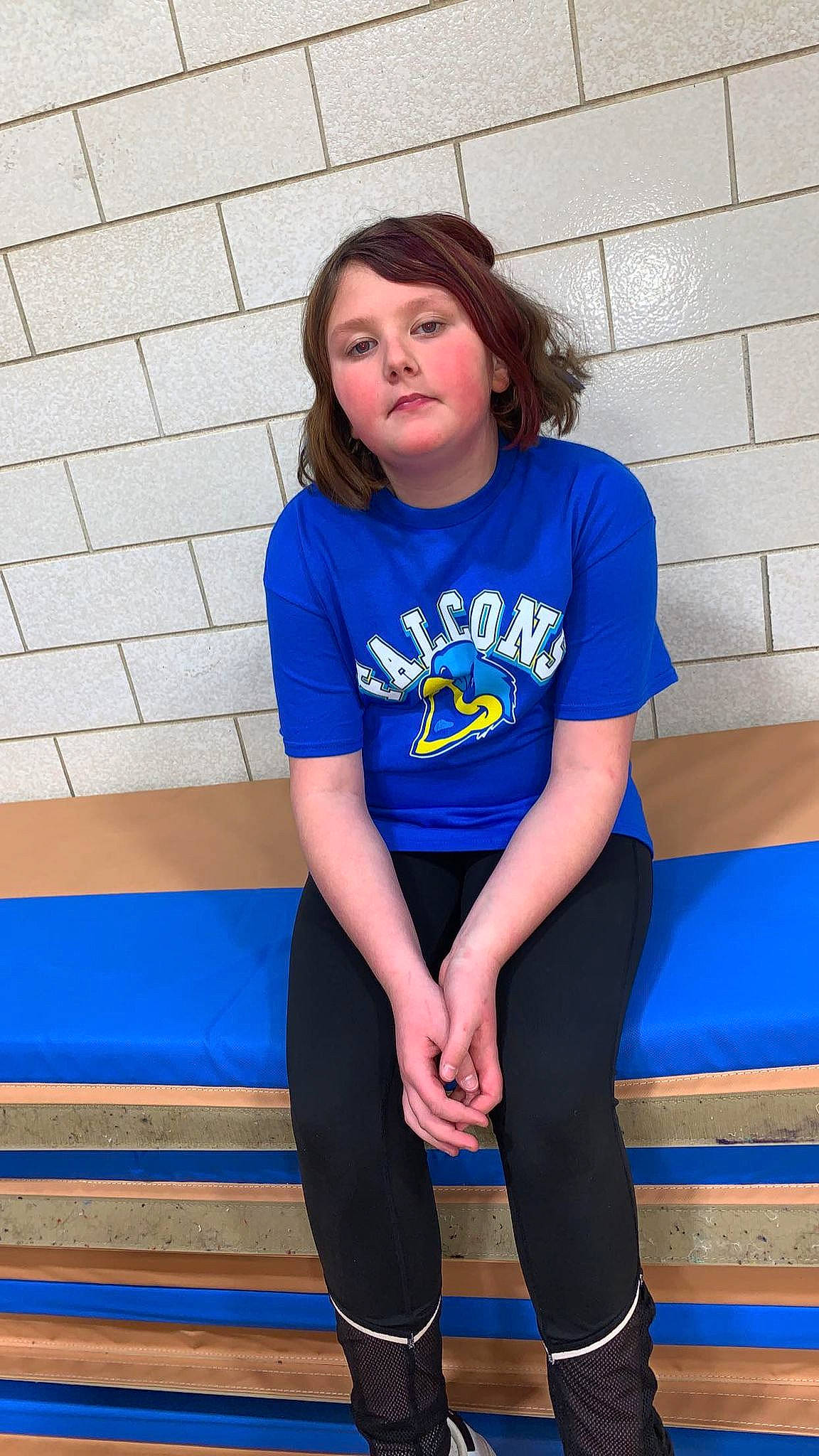 Brianna is registered to the contest to win money with this photo: active_pants, blue, clothing, cool, denim, electric_blue, happy, human_leg, jersey, joint, knee, leisure, long_hair, neck, person, shoulder, sleeve, sportswear, t_shirt, thigh