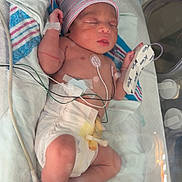 Carmen joined the competition — help win amazing prizes! baby, bed, blanket, child, cute, diaper, hat, healthcare, hospital, incubator, infant, medical_equipment, monitoring, newborn, patient, peaceful, resting, sleeping, small, wired