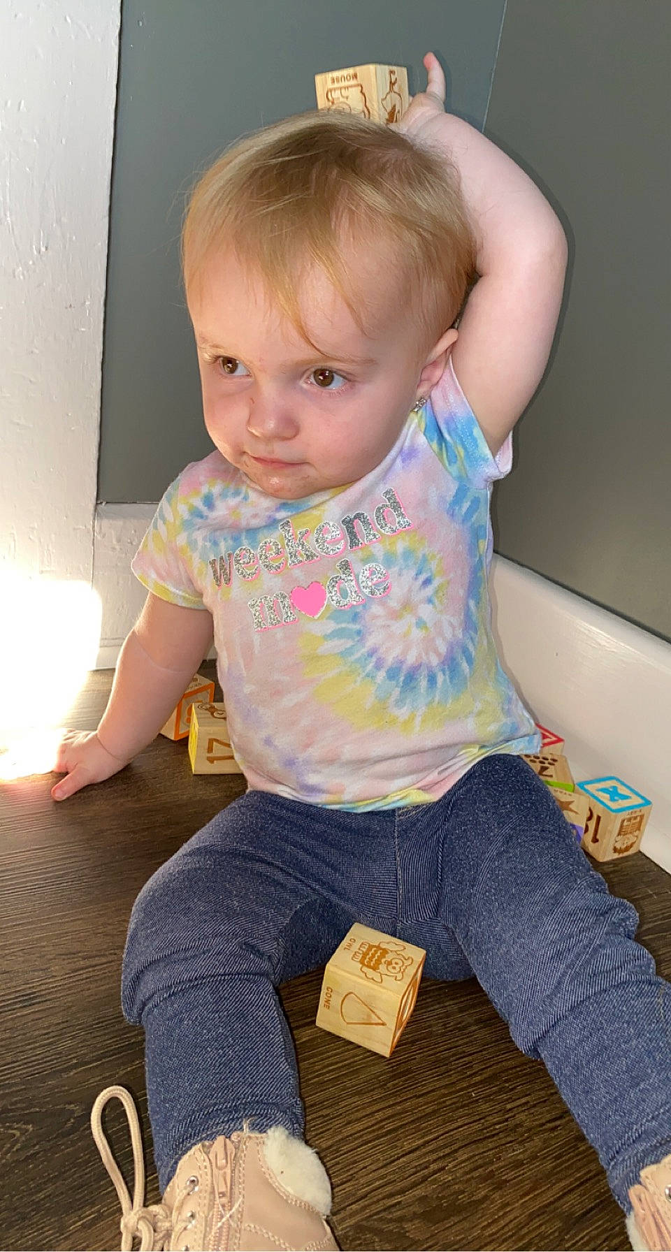 Kinzley joined the competition — help win amazing prizes! baby, baby_toddler_clothing, cheek, child, comfort, denim, finger, flooring, fun, head, knee, pattern, person, sitting, skin, sleeve, standing, t_shirt, thigh, toddler