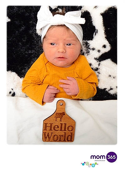 Everleigh joined the competition — help win amazing prizes! baby, baby_toddler_clothing, box, cap, child, costume_hat, fashion_accessory, font, fur, greeting_card, happy, headwear, illustration, linens, outerwear, person, photo_caption, product, rectangle, sleeve