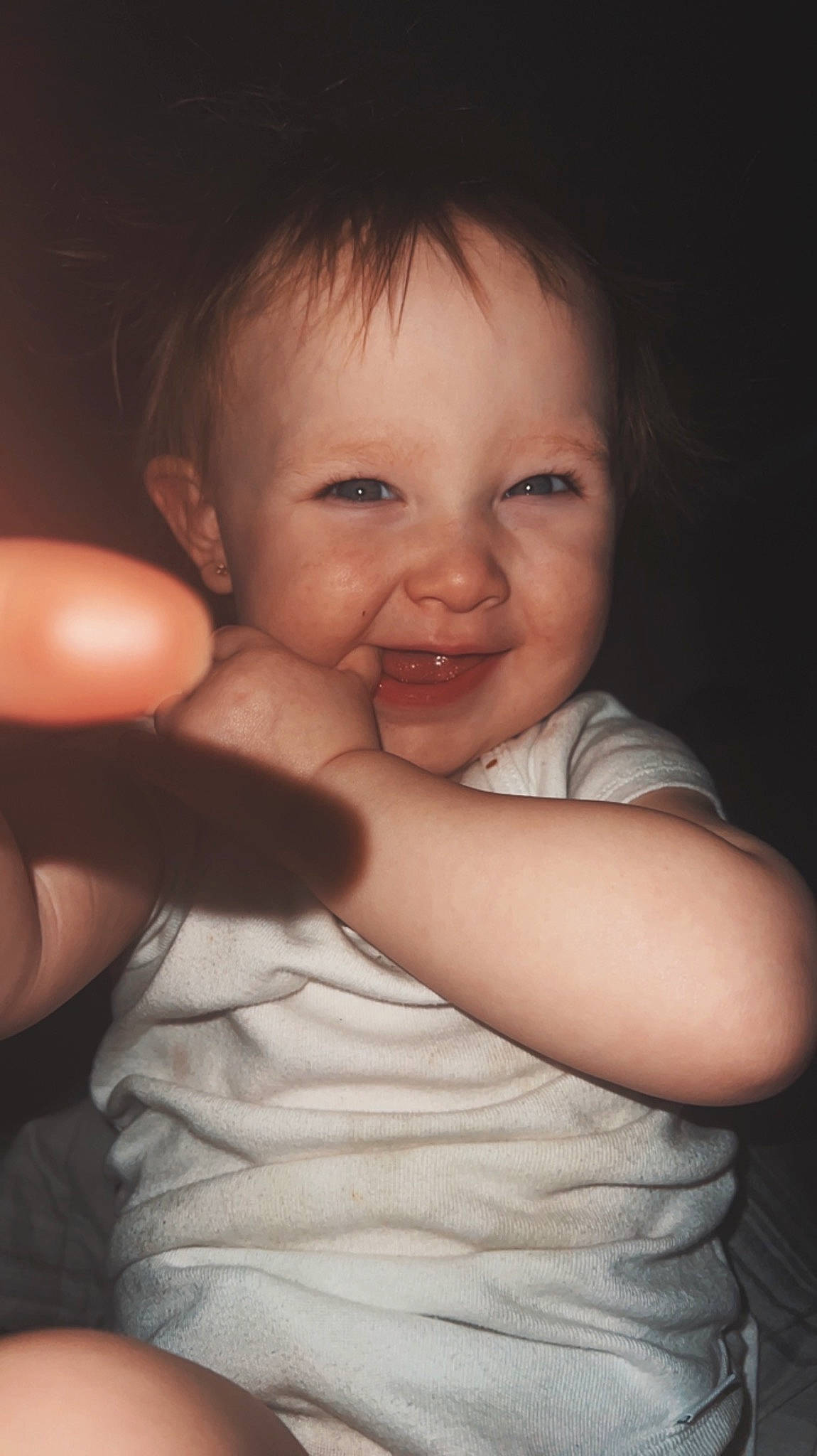 Eliza is registered to the contest to win money with this photo: arm, baby_toddler_clothing, cheek, chin, ear, eyebrow, eyelash, finger, flash_photography, gesture, hand, happy, iris, joy, lip, mouth, nose, person, skin, sleeve