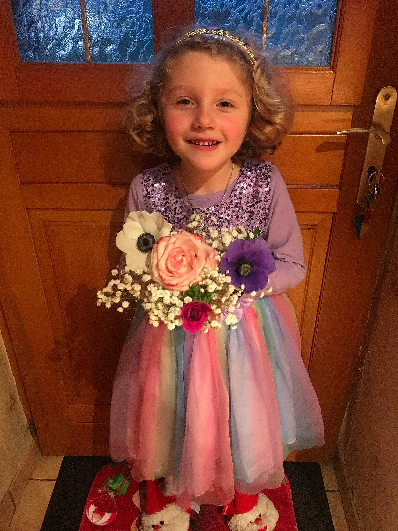 Florine participe au concours pour gagner de l'argent avec cette photo : baby_toddler_clothing, cheek, child, door, dress, event, flooring, floral_design, flower, formal_wear, fun, happy, joy, magenta, peach, person, pink, room, sitting, smile