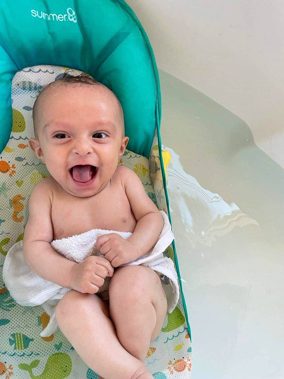 River joined the competition — help win amazing prizes! baby, baby_products, baby_toddler_clothing, cap, chair, child, comfort, eye, fashion_accessory, fun, happy, hat, leisure, pattern, person, sitting, skin, smile, textile, thigh