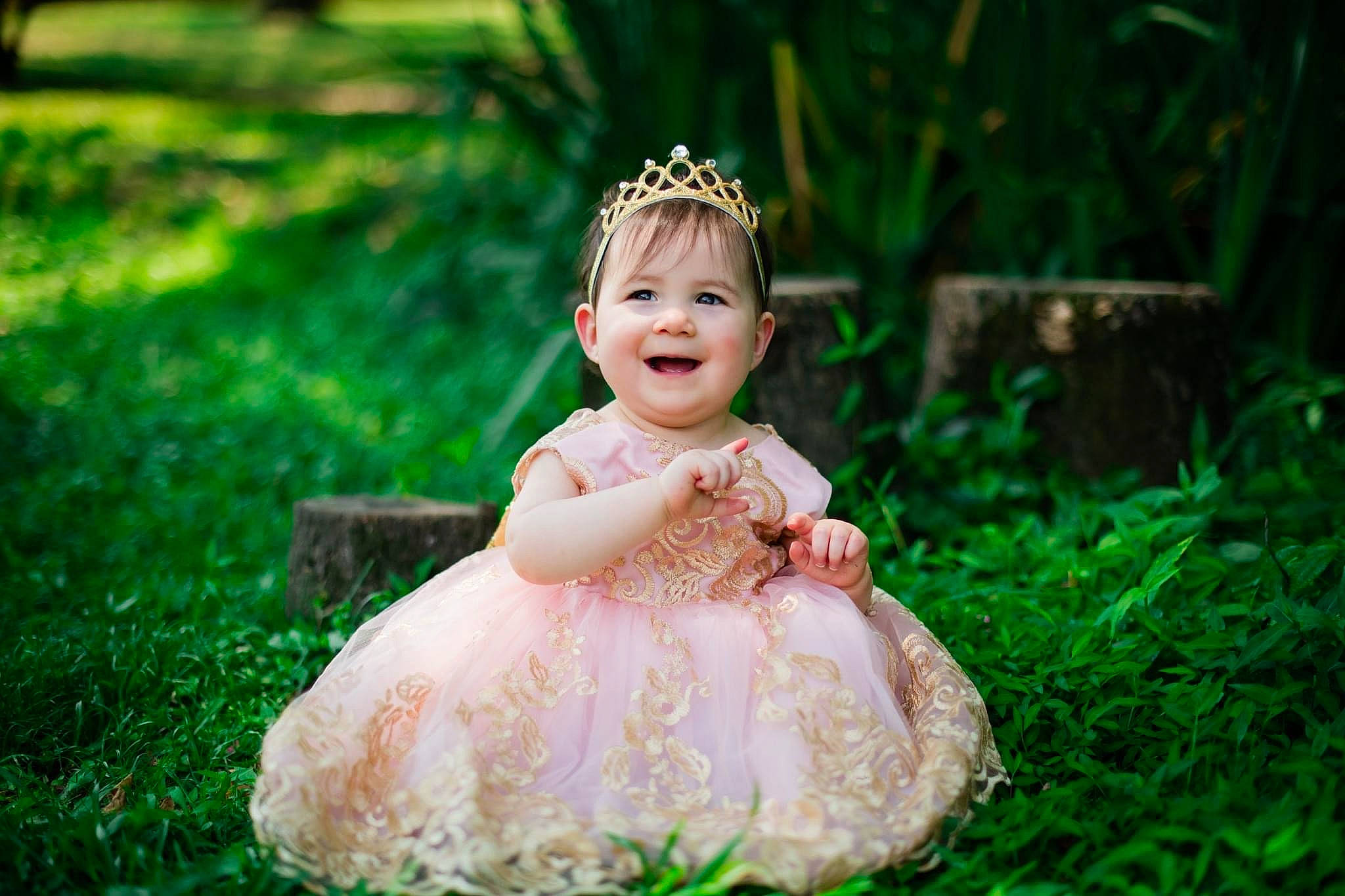 Alice is registered to the contest to win money with this photo: bridal_accessory, dress, eye, flash_photography, fun, grass, grass_family, green, hair, hair_accessory, happy, head, headgear, headpiece, jewellery, joy, people_in_nature, person, pink, plant